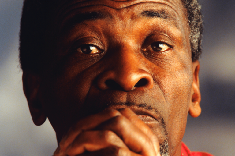 Black man with hands clasped. Close-up. Portrait.