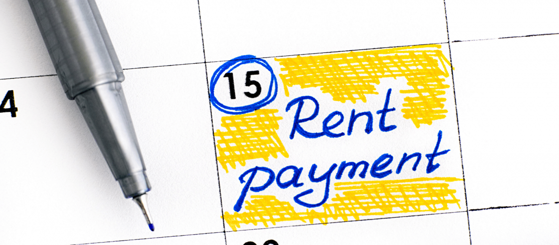 Reminder to pay rent in calendar with blue pen