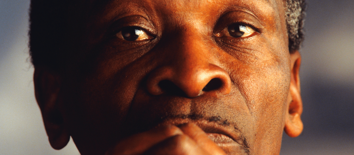 Black man with hands clasped. Close-up. Portrait.