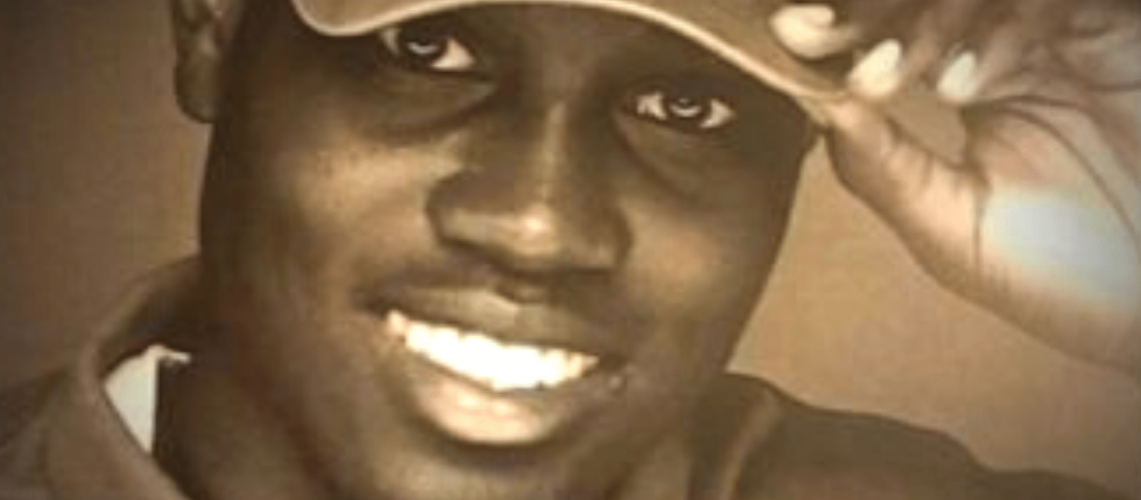 Image of the late Ahmad Aubrey smiling